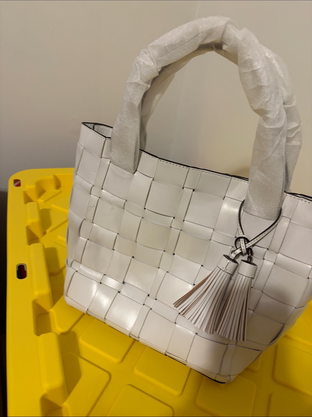 Woven White Tote Bag with Tassel Accent